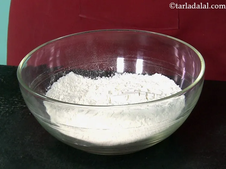 Step 34 – In a deep bowl, take plain flour.