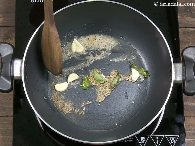Step 18 – Add curry leaves and saut&eacute; on a medium flame for 30 seconds.