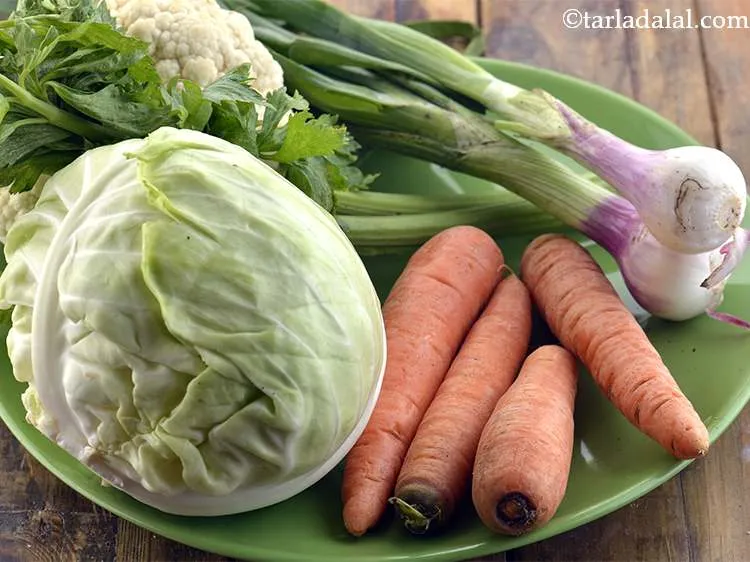 Step 3 – For the&nbsp;<strong>Clear Vegetable Stock</strong>, scrub the vegetables and wash them to remove any dirt.