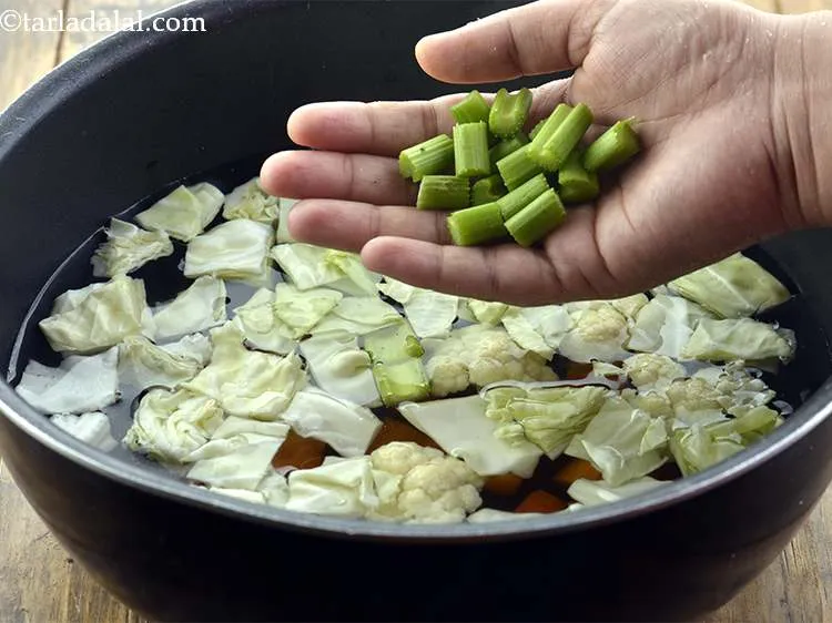 Step 9 – Add the celery. This is like a crucial flavoring agent to any stock recipe.