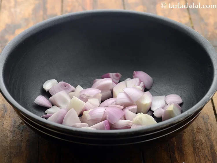 Step 2 – To make onion paste for <strong>Hariyali kofta</strong>, in a kadhai add roughly chopped onions. Instead …