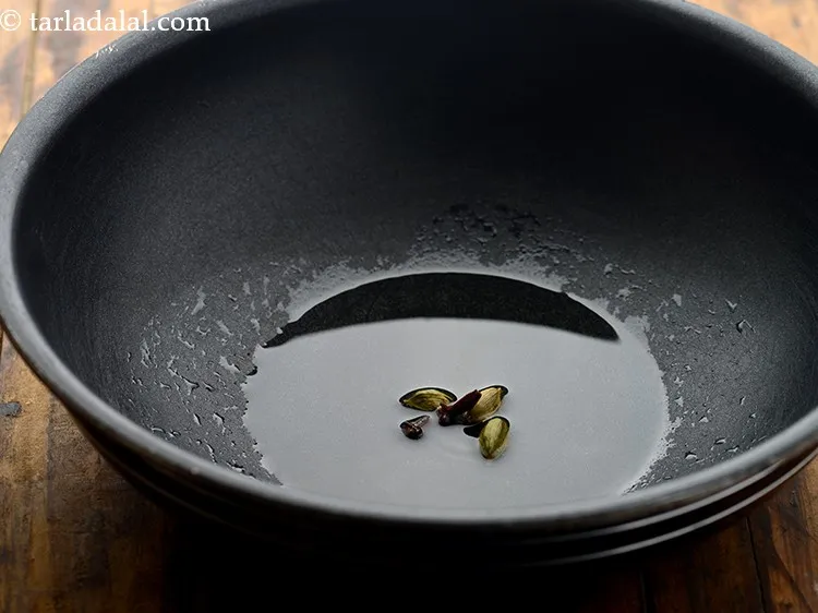 Step 12 – Add cloves. These whole spices provide a beautiful aroma and unique flavour to the <strong>shahi …