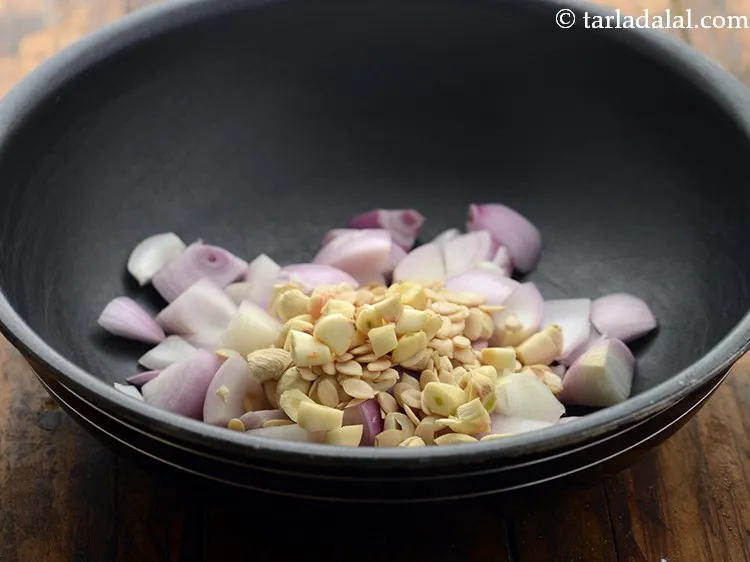 Step 5 – Add roughly chopped garlic.