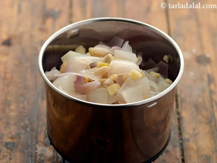 Step 10 – Keep aside to cool completely and transfer to a mixer jar.