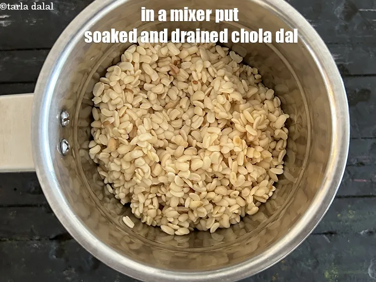 Step 8 – In a mixer put the&nbsp;<meta charset="UTF-8" />1 1/2 cups&nbsp;<a href="glossary-soaked-chola-dal-1926i">soaked and drained chola dal (split …