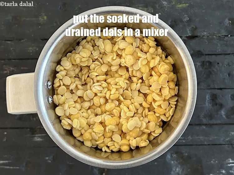 Step 13 – Put the soaked and drained dals in a mixer.