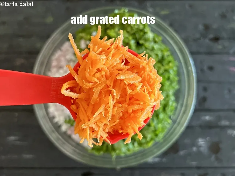 Step 23 – Add&nbsp;<meta charset="UTF-8" />1/4 cup&nbsp;grated&nbsp;<a href="glossary-carrot-gajar-gajjar-253i">carrot</a>.