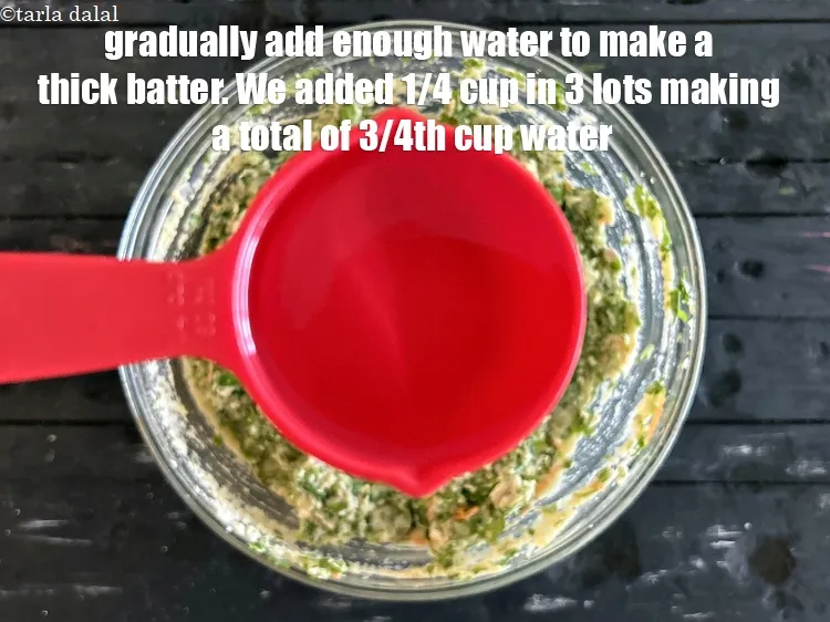 Step 26 – Gradually add water as required to make a thick batter. We added 1/4 cup in …