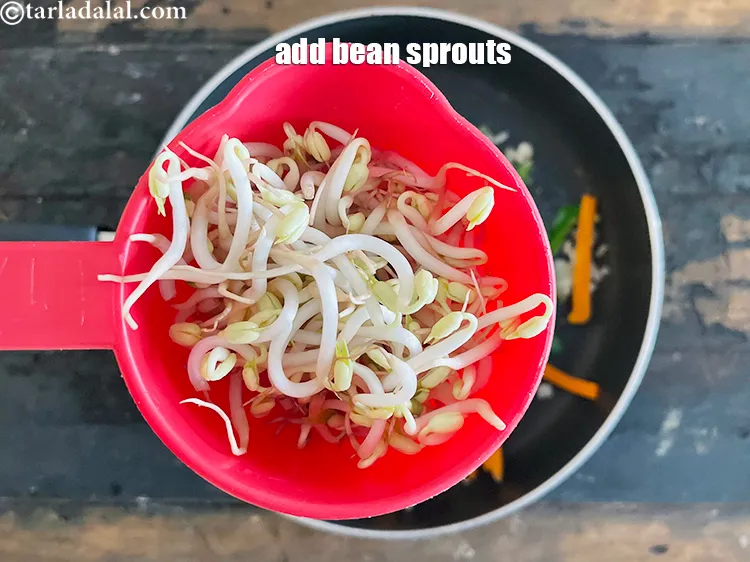Step 17 – Add 3/4 cup&nbsp;<a href="https://www.tarladalal.com/glossary-bean-sprouts-193i">bean sprouts</a>&nbsp;(readily available in the market).