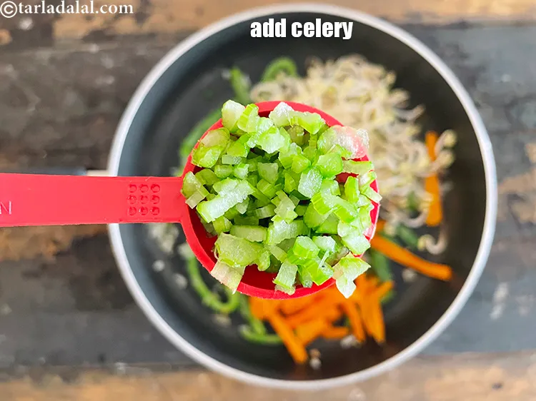 Step 18 – Add 1 tbsp&nbsp;finely&nbsp;<a href="https://www.tarladalal.com/glossary-chopped-celery-799i">chopped celery</a>.