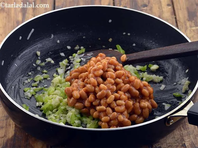 Step 8 – Now it&rsquo;s time to add the baked beans.