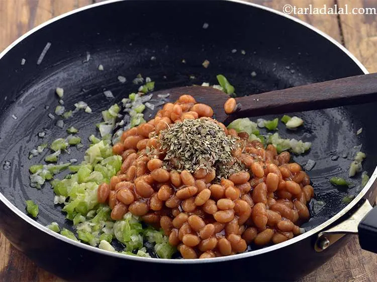 Step 9 – Add oregano for its tangy and peppery flavour.