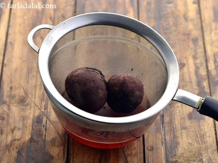 Step 11 – Drain and remove the water. Cool the beetroot slightly.