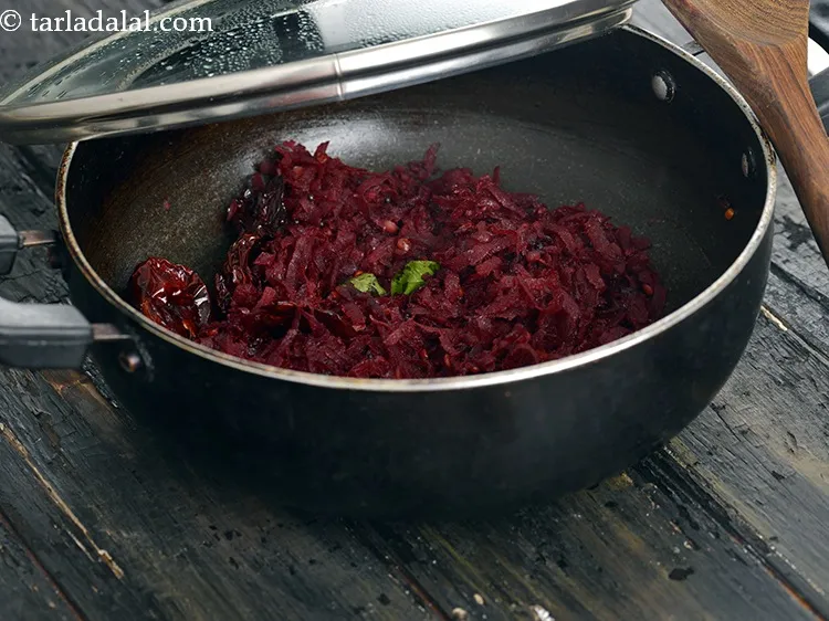 Step 30 – Mix well. Cover with a lid and cook on medium flame for 7 minutes, while …