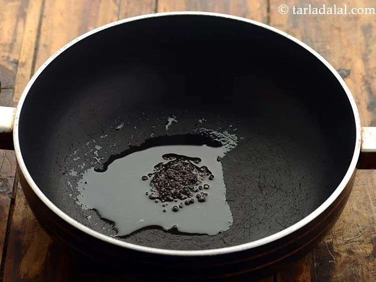 Step 22 – Add 1/2 tsp&nbsp;<a href="https://www.tarladalal.com/glossary-mustard-seeds-sarson-rai-sarson-ke-beej-525i">mustard seeds ( rai / sarson)</a>.