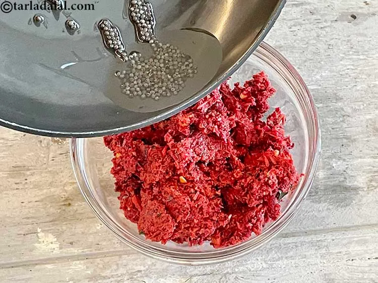 Step 29 – Pour the tempering over the beetroot chutney.