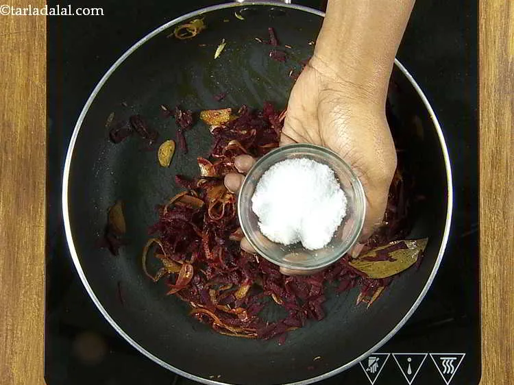 स्टेप 13 – नमक और १/४ कप पानी डालें।