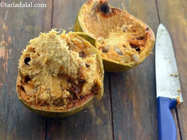 Step 2 – To make the <strong>Bela pana</strong>, take a medium sized bel. Break it open with the …