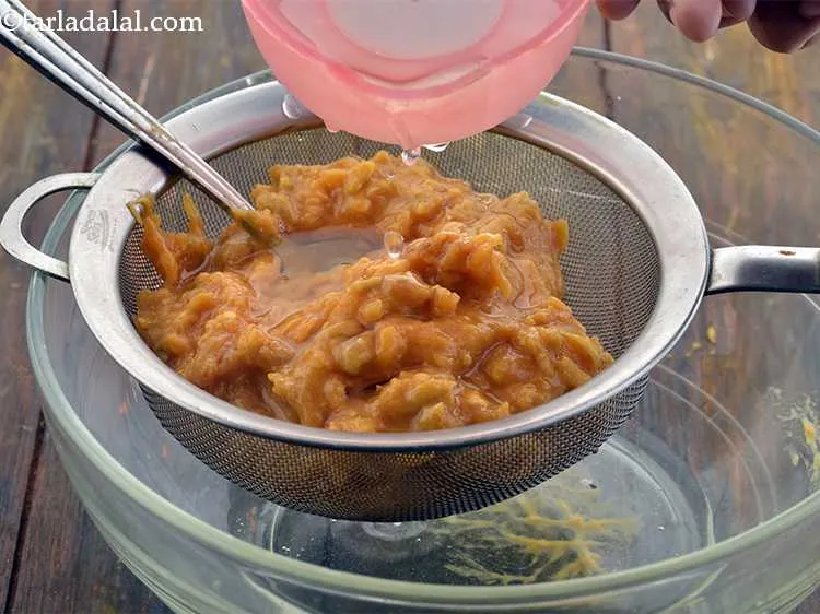 Step 5 – Add about &frac12; cup of water and strain the pulp using a strainer. Transfer it …