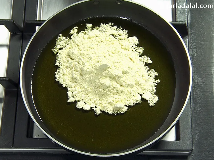 Step 4 – When the ghee is hot and melts, carefully add the besan. Sift the besan if …