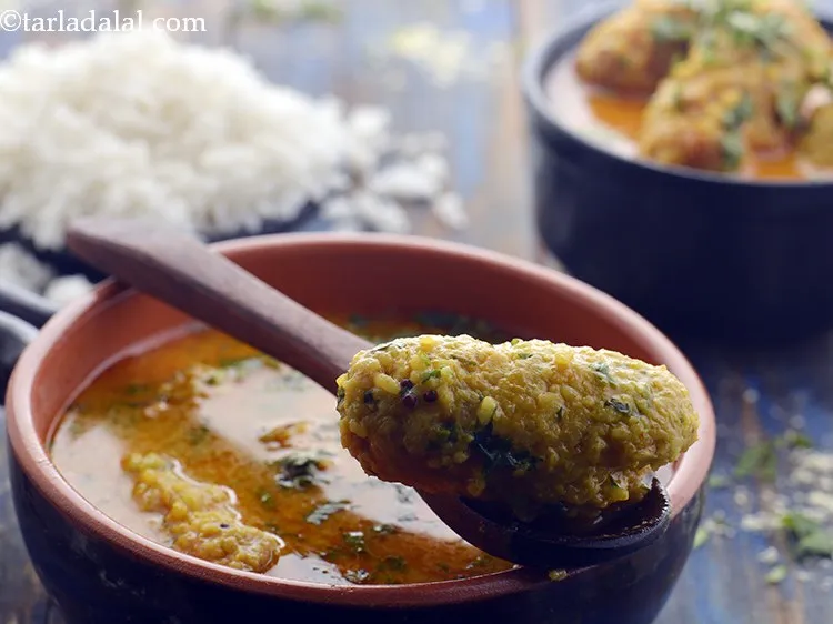 Step 27 – Serve the&nbsp;<strong>bhaat na rasawala muthia recipe | &nbsp;Gujarati rasiya muthia |&nbsp;</strong>&nbsp;hot.