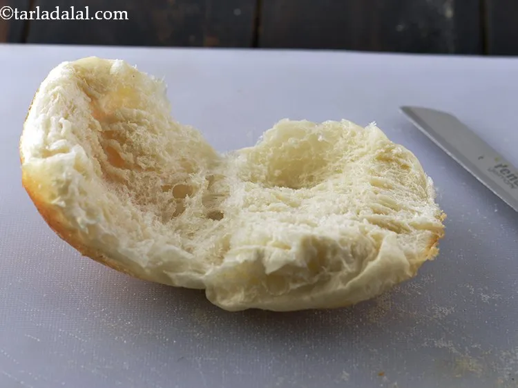 Step 22 – To make the&nbsp;<strong>bhajiya pav</strong>, slit a ladi pav horizontally. See how to make <a href="https://www.tarladalal.com/Ladi-Pav-Eggless-Homemade-Laadi-Pav-Buns-40720r">ladi …