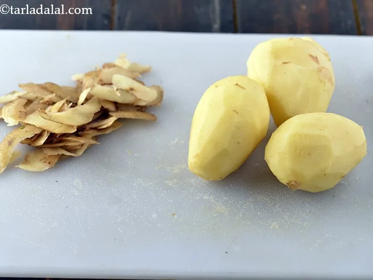 Step 3 – Remove the skin with the help of a peeler and discard it.