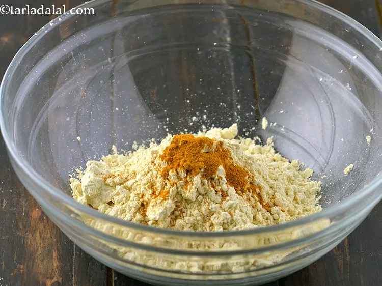 Step 7 – Add the turmeric powder which will provide a nice yellow hue to the batter.
