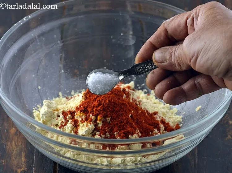 Step 9 – Add the salt. If besan does not suit you, then add a little ajwain to …