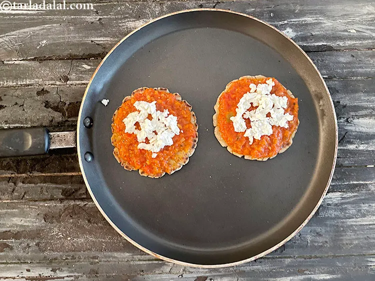 Step 43 – Top with 1 1/2 &nbsp;tbsp of cheese or paneer&nbsp;evenly over it.