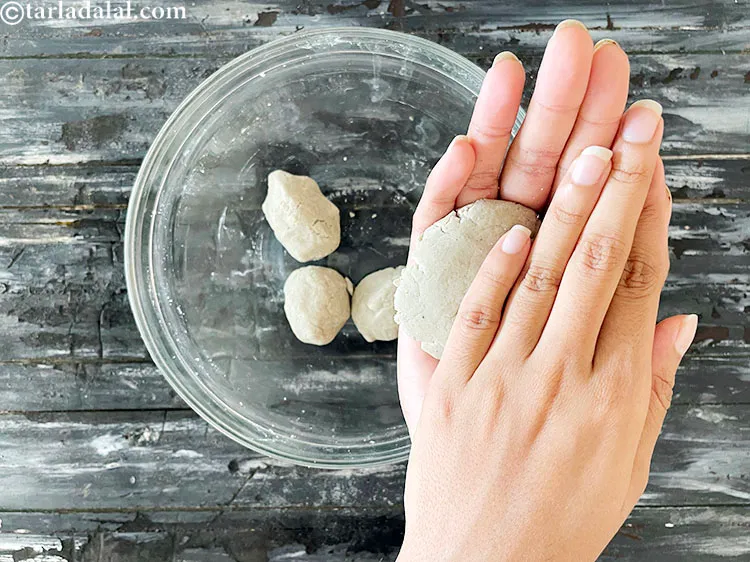 Step 35 – Flatten dough between the palms of your hands.