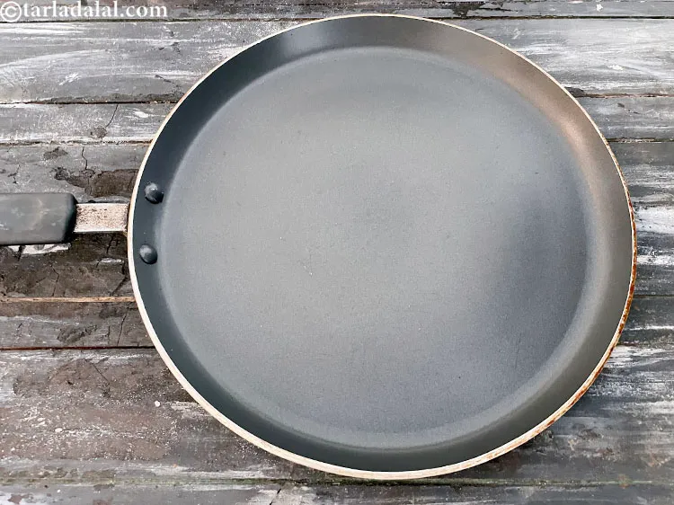 Step 37 – Heat a non-stick tava (griddle).