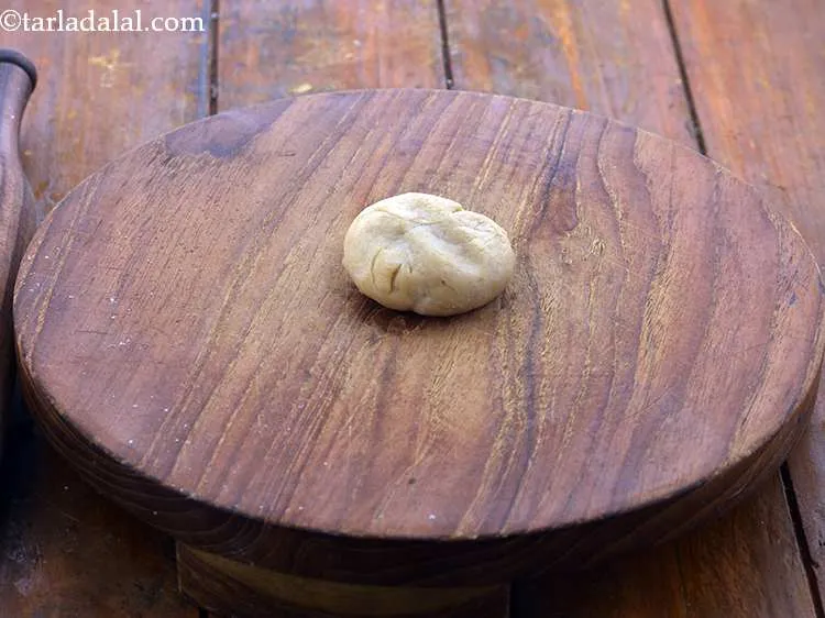 Step 11 – Flatten a portion on a rolling board.