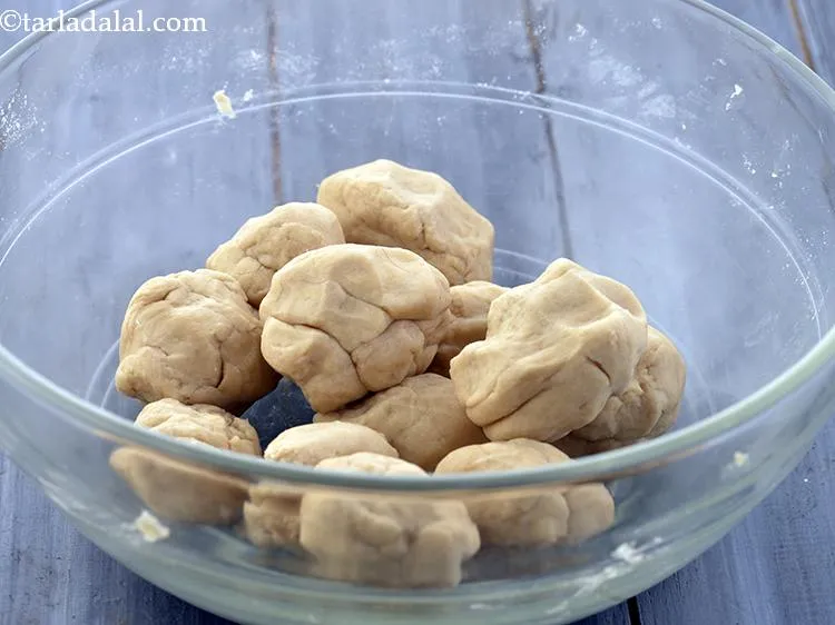 Step 9 – Divide the dough into 10 equal portions.