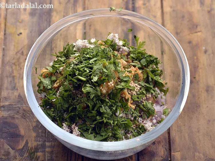 Step 12 – Add finely chopped coriander. It adds a fresh hint to the stuffed eggplant masala.