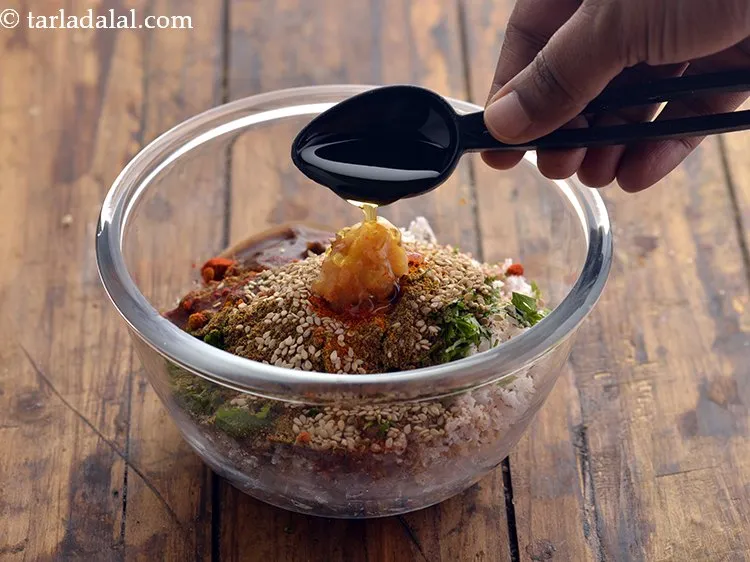 Step 12 – Add oil. This helps in binding together all the ingredients.