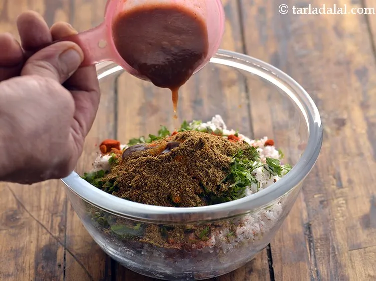 Step 9 – Add tamarind pulp. Learn how to make&nbsp;<a href="https://www.tarladalal.com/Tamarind-Pulp-Imli-Pulp-32648r" target="_blank">Tamarind Pulp, Imli Pulp</a>.