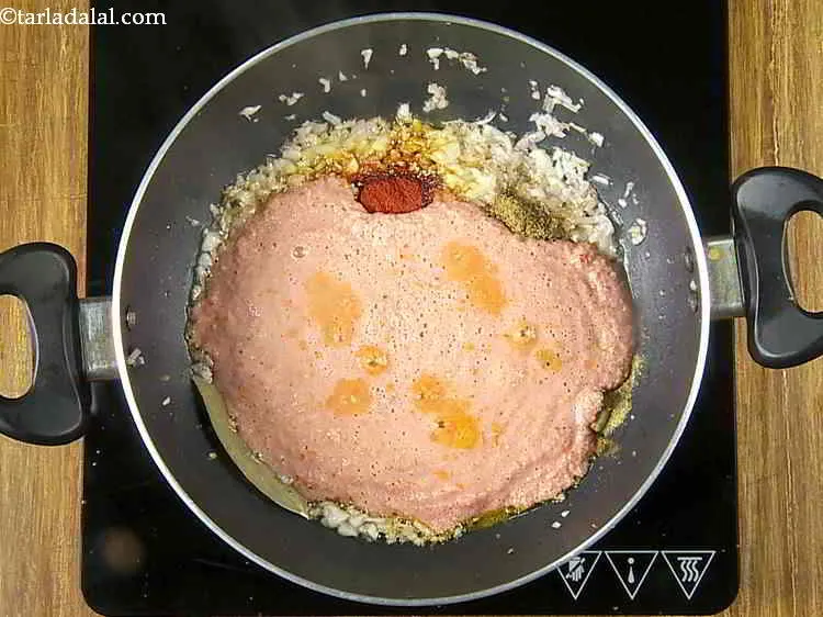 Step 22 – Add the prepared tomato paste. The bhindi masala gravy is made using the basic onion-tomato …