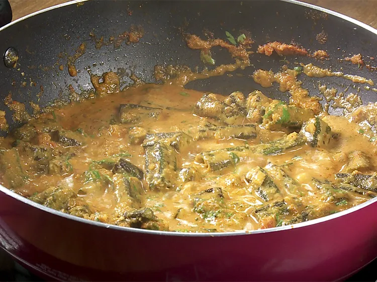 Step 32 – Add the coriander, mix&nbsp;<strong>&nbsp;Bhindi Masala Gravy&nbsp;</strong>well &nbsp;and cook on a medium flame for 1 to …