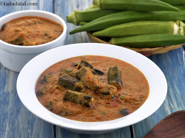 Step 33 – Serve the <strong>bhindi masala gravy</strong> hot with chapatti, phulka and rotis.