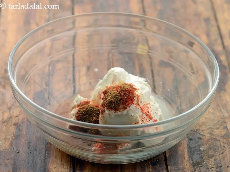 Step 4 – Add cumin seeds powder. It provides an earthy flavor to the bhujiya raita.&nbsp;