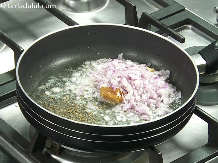 Step 13 – Add 1/2 cup&nbsp;finely&nbsp;<a href="https://www.tarladalal.com/glossary-chopped-onions-722i">chopped onions</a>.