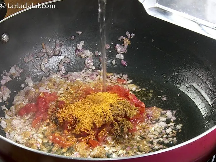 Step 10 – Add 1 tbsp water to prevent the dry spices from burning.