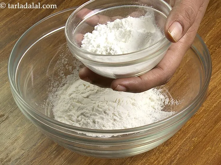 Step 24 – Add cornflour. We have used both maida and cornflour to get that really crunchy outer …