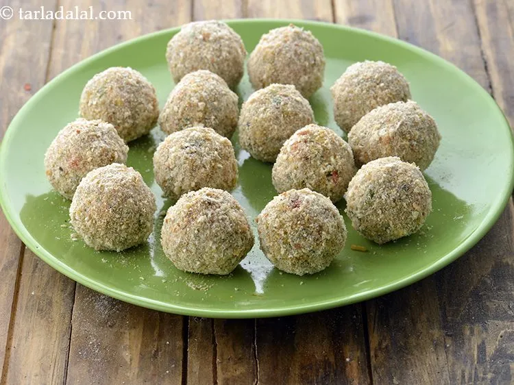 Step 34 – Similarly, coat all the biryani balls in plain-flour water mixture and breadcrumbs. Keep aside. If …