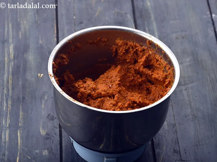 Step 14 – Blend in a mixer to a smooth paste using &frac12; cup of water. Keep aside.