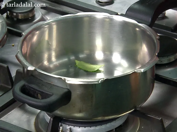 Step 27 – Add&nbsp;5 to 7&nbsp;<a href="https://www.tarladalal.com/glossary-curry-leaves-kadi-patta-kadipatta-388i">curry leaves (kadi patta)</a>.