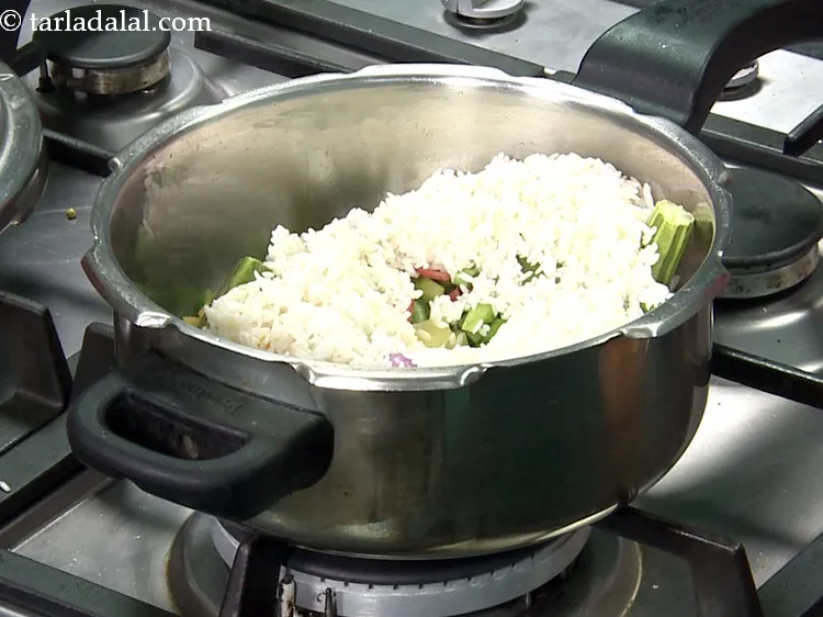 Step 35 – Add the soaked and drained rice for <strong>bisi bele bath recipe | Karnataka style bisibelebath …
