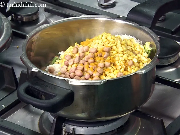 Step 38 – Add 1/2 tsp&nbsp;<a href="https://www.tarladalal.com/glossary-turmeric-powder-haldi-645i">turmeric powder (haldi)</a>.