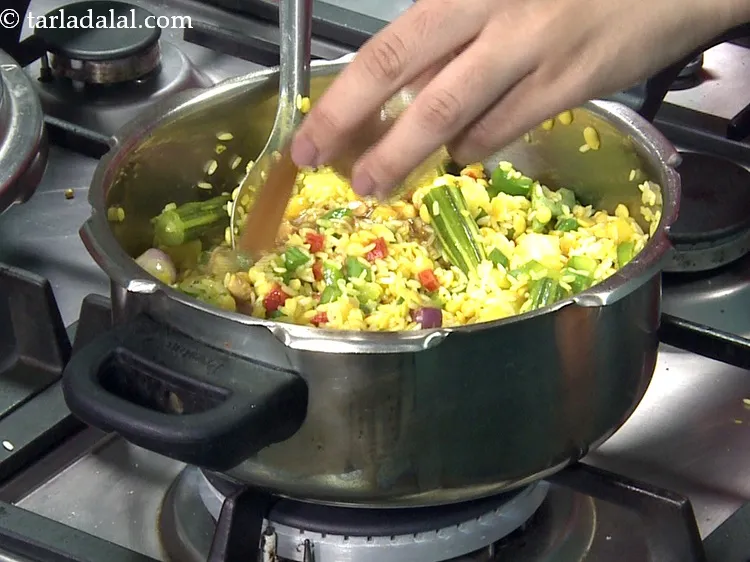 Step 40 – Add 2 tbsp&nbsp;<a href="https://www.tarladalal.com/glossary-tamarind-pulp-tamarind-extract-imli-ka-pulp-838i">tamarind (imli) pulp</a>. See above for recipe of tamarind pulp.